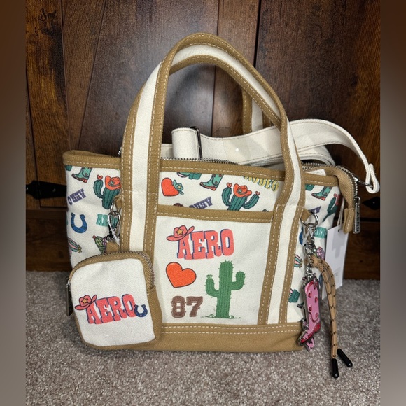 Aeropostale Handbags - Aeropostale Tan and Cream Tote( 11inches wide , 11 inches in height)
